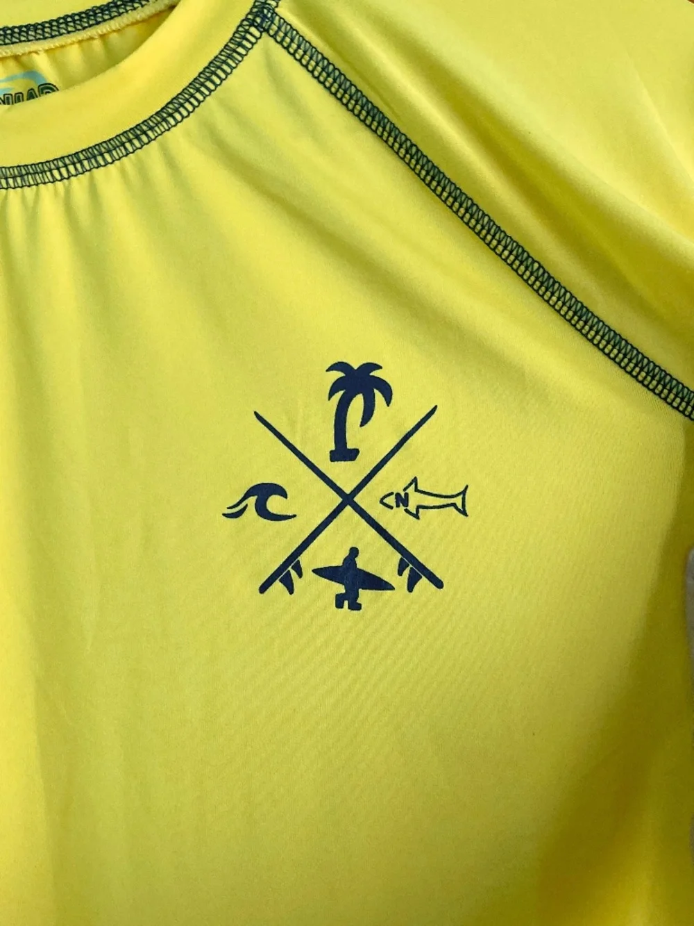 Boy’s size 12/14 Quad Seven banana yellow long sleeved swim shirt/rash guard